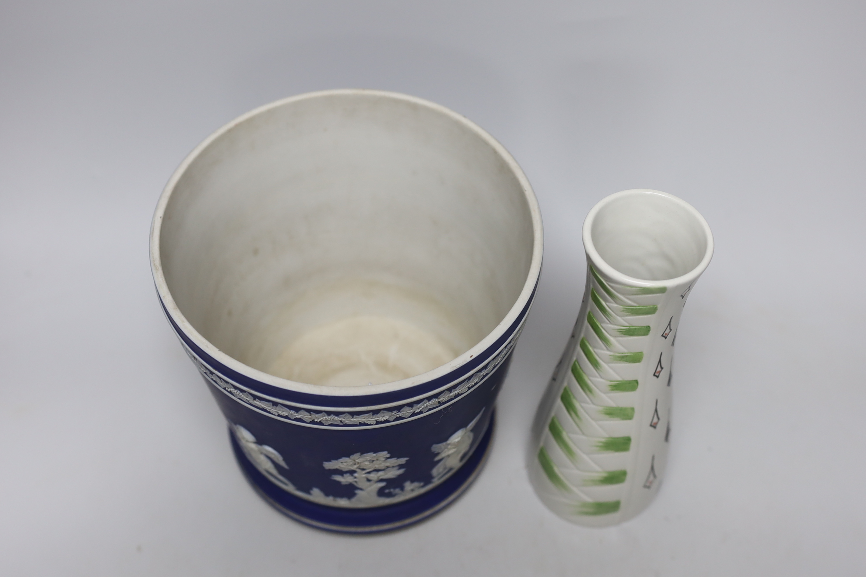 A 19th century Jasperware jardiniere and a J Wood for Burslem vase, tallest 22.5cm